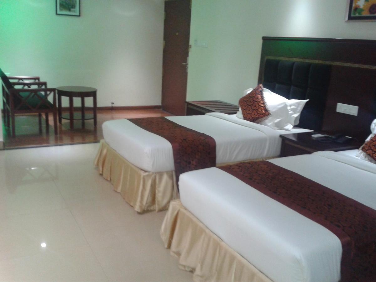 Hotel Hiton Perintalmanna Номер фото